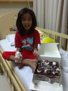 Iwit and her birthday cake in her first class room @ RS Mitra Keluarga Depok